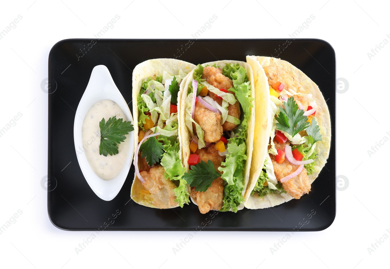 Photo of Yummy fish tacos with sauce isolated on white, top view