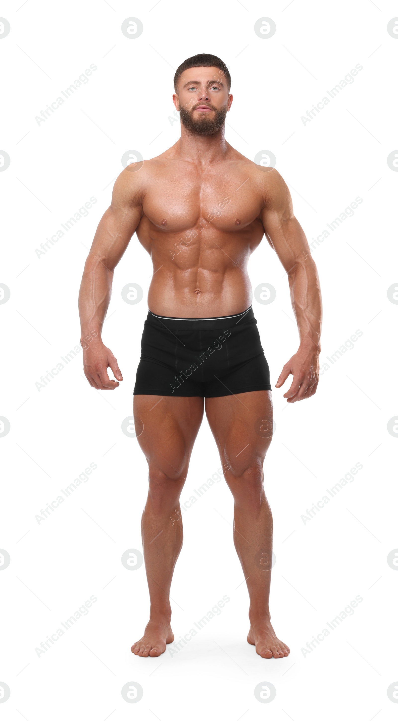 Photo of Young bodybuilder with muscular body on white background