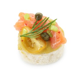 Photo of Tasty canape with salmon, tomatoes, capers and herbs isolated on white