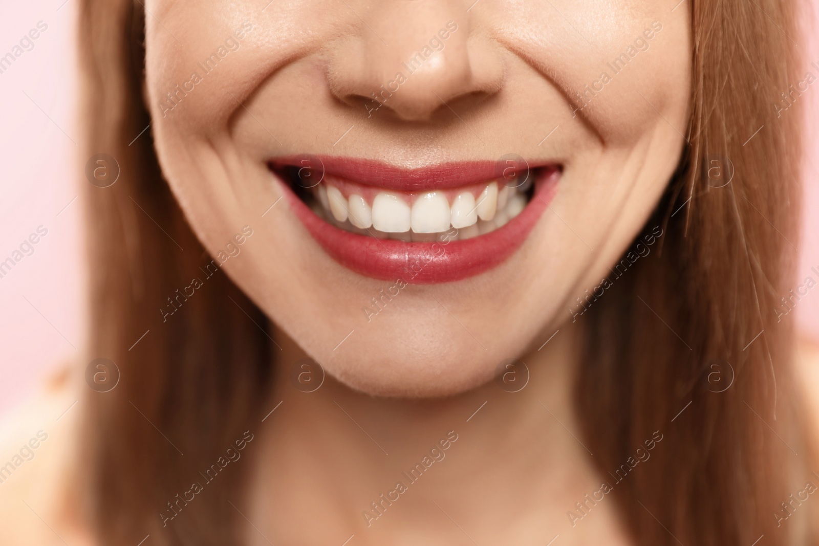 Photo of Smiling woman with perfect teeth, closeup view