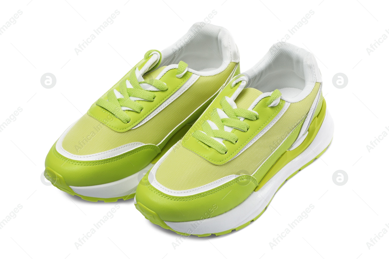 Photo of Pair of stylish light green sneakers on white background