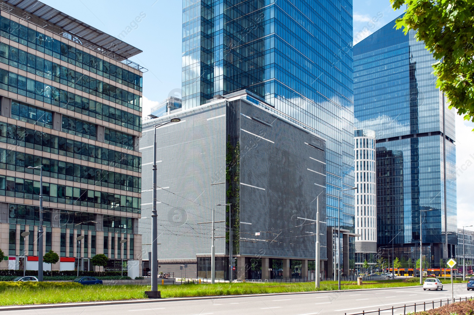 Photo of Beautiful buildings with many windows on cloudy day in city