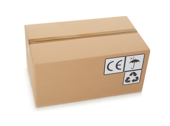 Photo of Cardboard box with different packaging symbols isolated on white. Parcel delivery