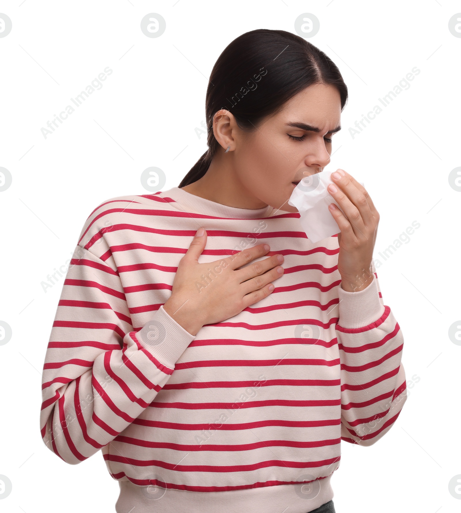 Photo of Woman with tissue coughing on white background. Cold symptoms