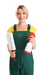 Female janitor with cleaning supplies on white background