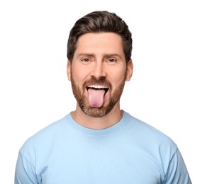 Photo of Man showing his tongue on white background