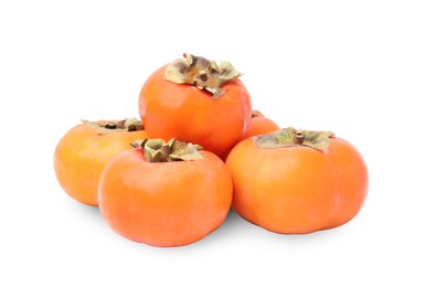 Whole delicious juicy persimmons on white background