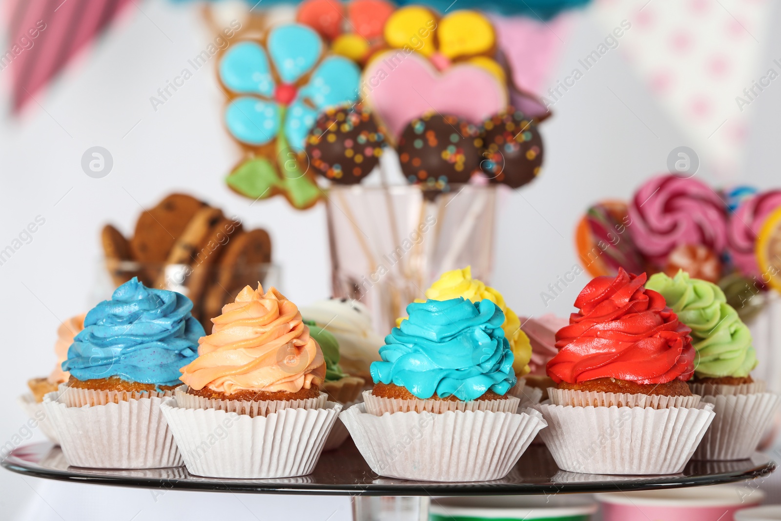 Photo of Candy bar with delicious treats for birthday party, closeup