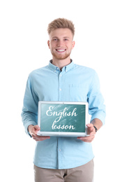 Young teacher with laptop on white background. Online English lesson