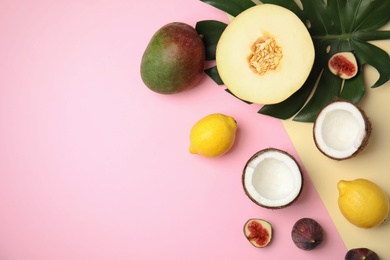 Photo of Flat lay composition with melon, other fruits and space for text on color background