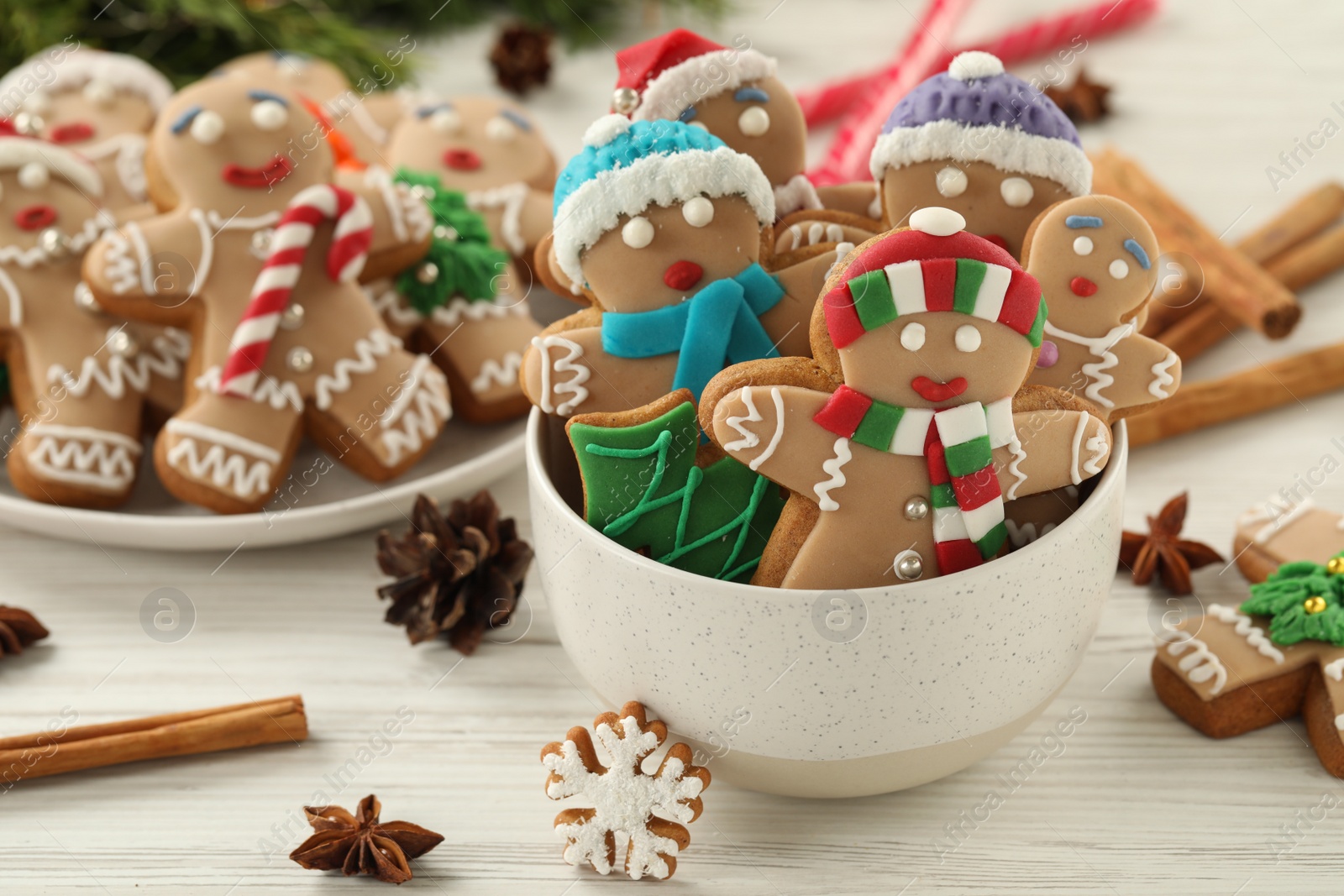 Photo of Delicious homemade Christmas cookies on white wooden table