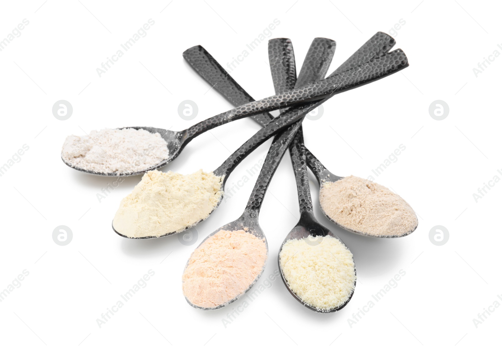 Photo of Spoons with different types of flours on white background