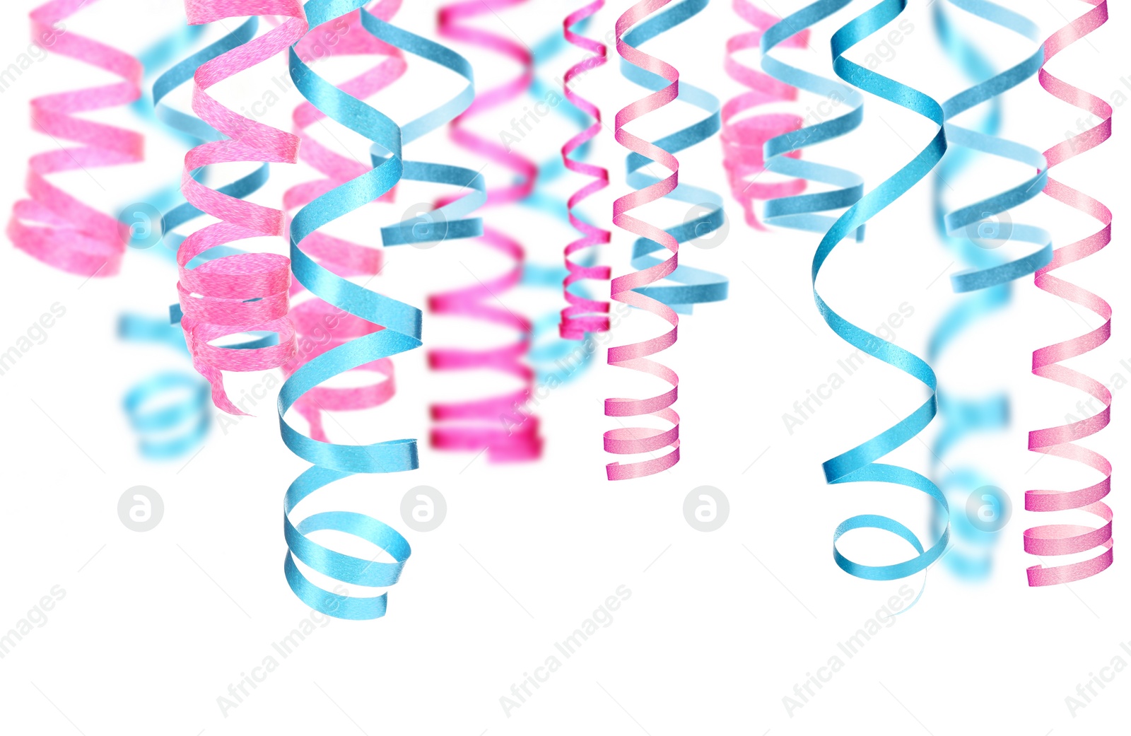 Image of Many pink and light blue serpentine streamers on white background. Party decor