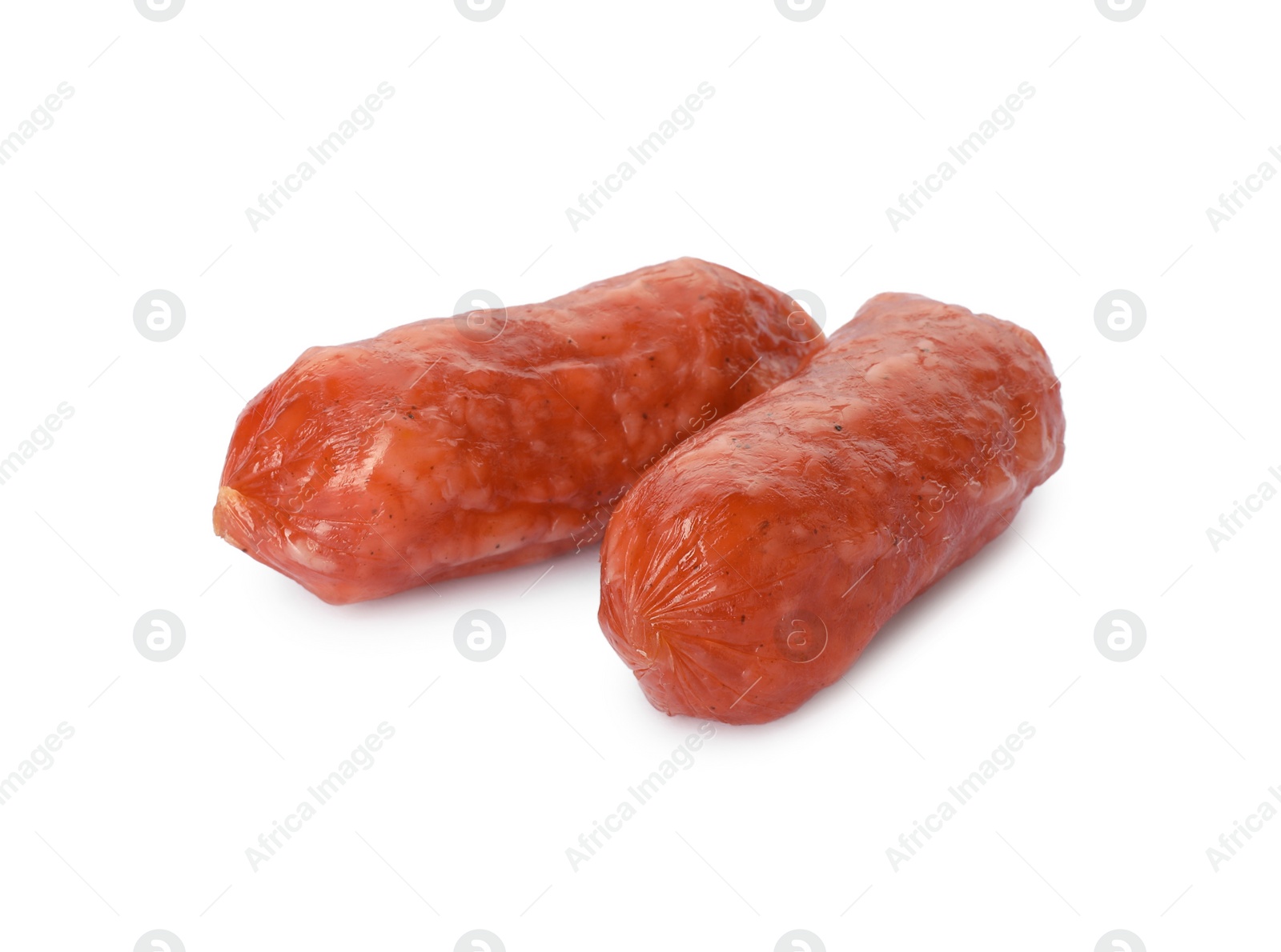 Photo of Thin dry smoked sausages isolated on white