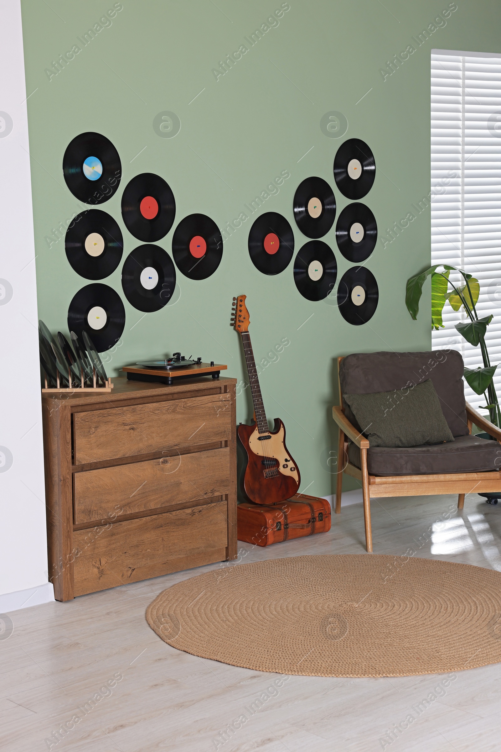 Photo of Living room interior decorated with vinyl records