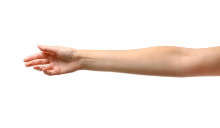 Photo of Young woman reaching hand for shake on white background, closeup