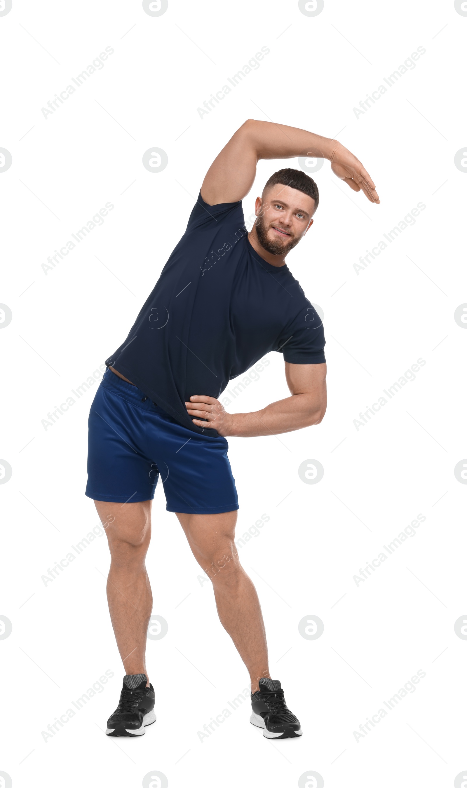 Photo of Man doing stretching on white background. Morning exercise