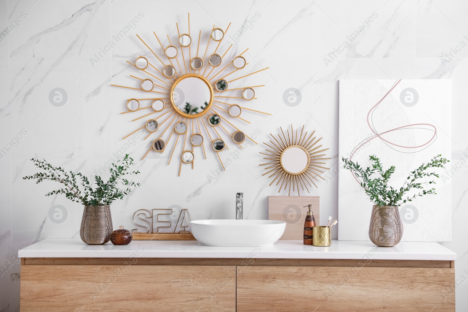 Photo of Modern bathroom interior with stylish mirror and vessel sink