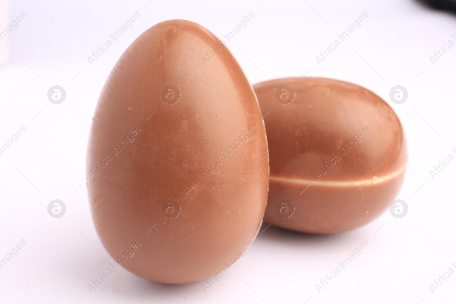 Photo of Sveti Vlas, Bulgaria - June 27, 2023: Unwrapped Kinder Surprise Eggs isolated on white