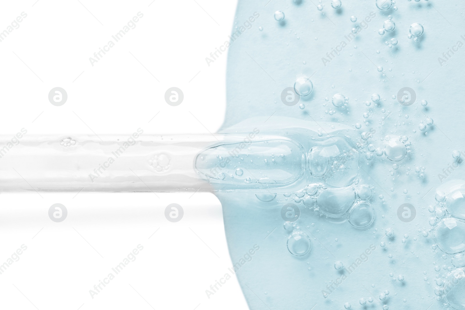 Image of Dropper with serum on white background, top view. Skin care product