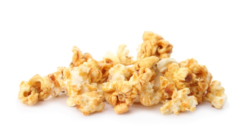 Pile of delicious caramel popcorn on white background