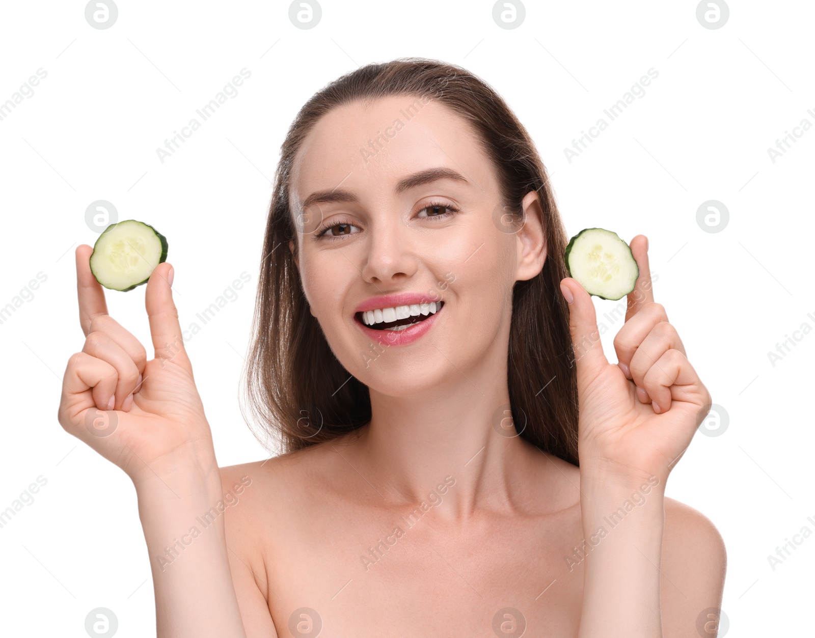 Photo of Beautiful woman with pieces of cucumber on white background