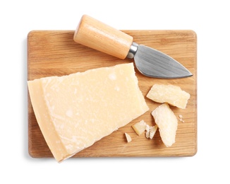 Photo of Parmesan cheese with knife and wooden board on white background, top view