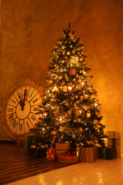 Festive room interior with beautiful Christmas tree