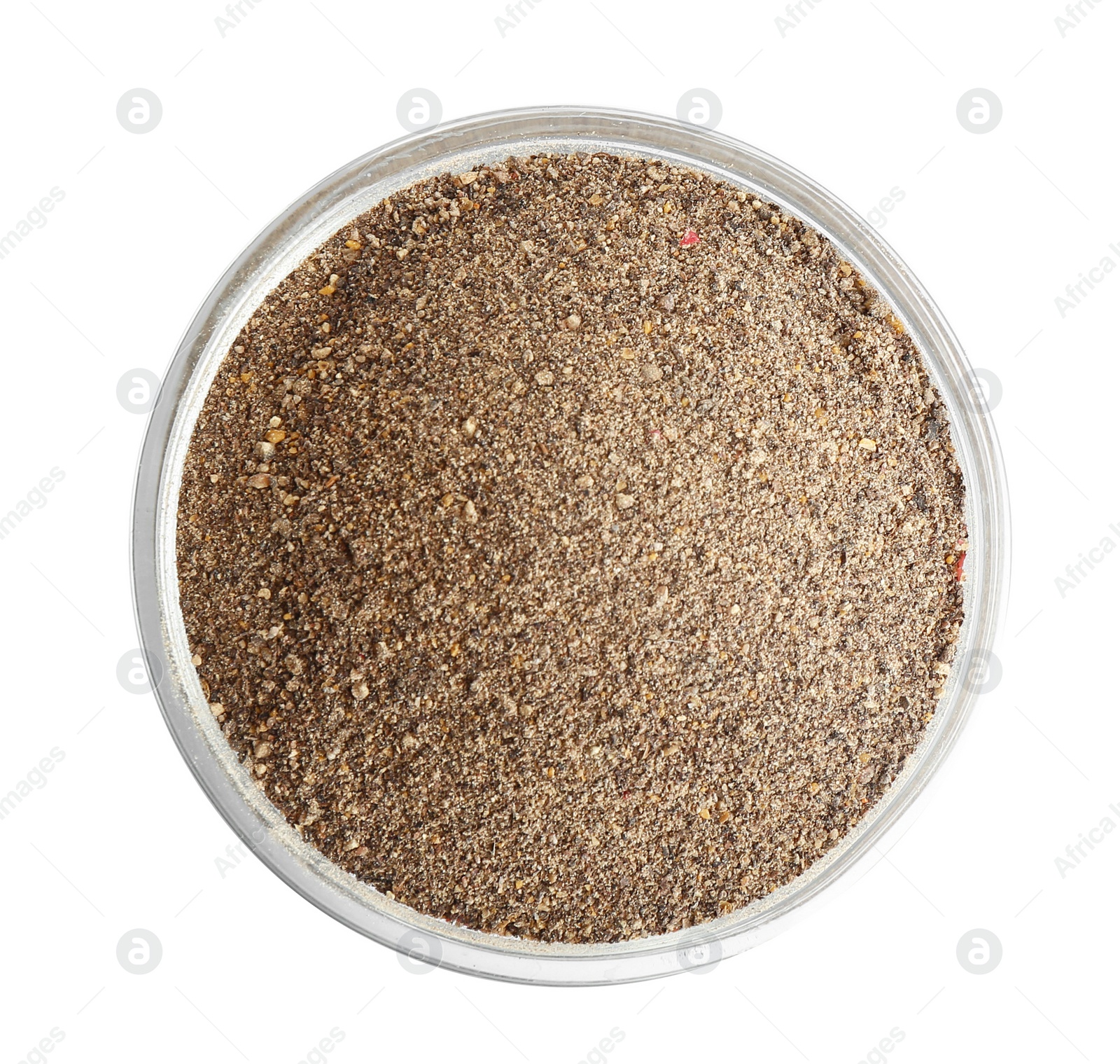 Photo of Bowl of ground black pepper isolated on white, top view