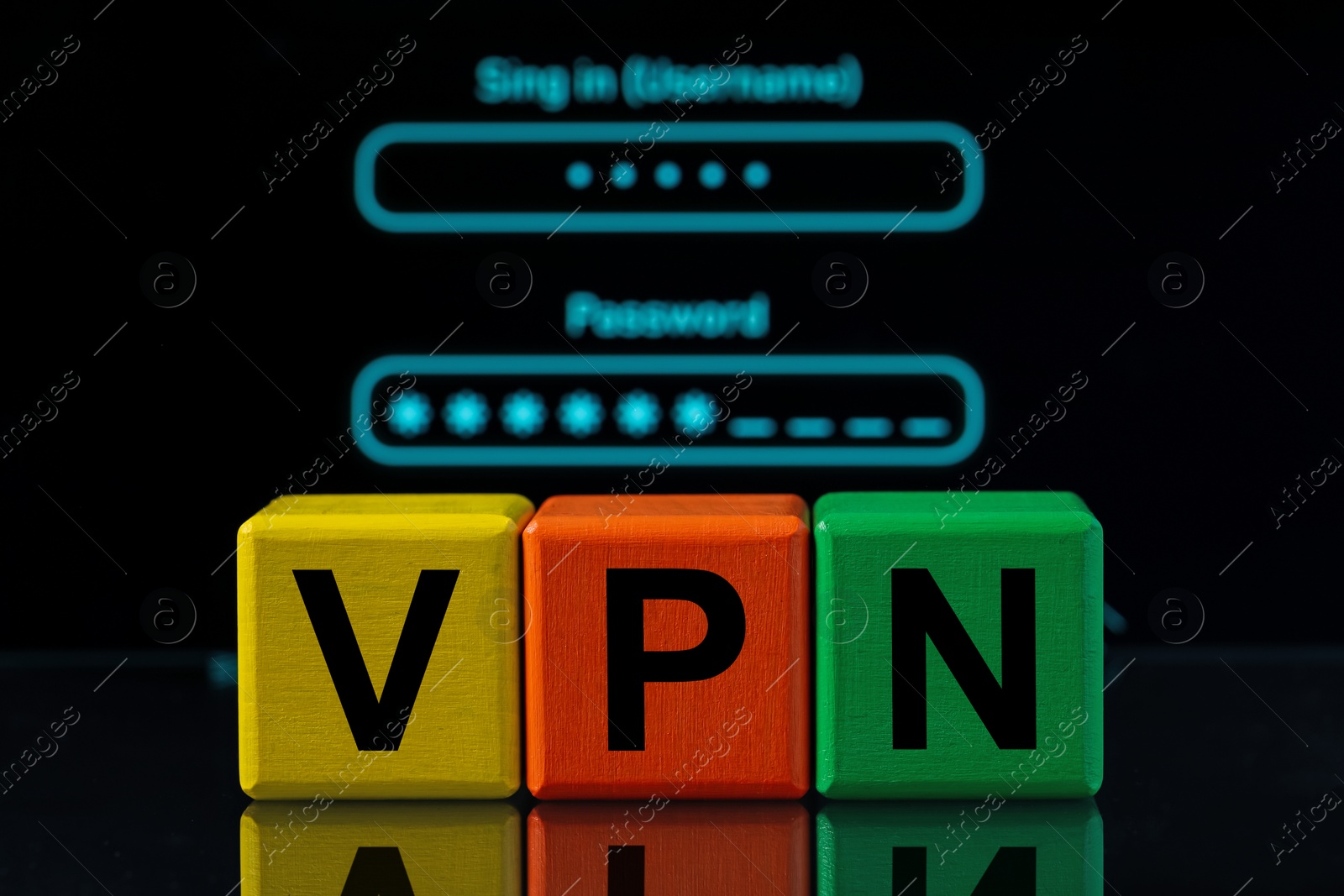 Photo of Acronym VPN (Virtual Private Network) made of colorful cubes on dark background