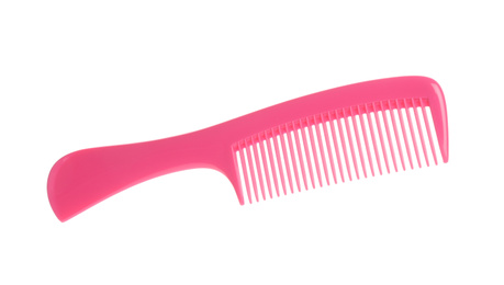 Photo of New pink hair comb isolated on white, top view