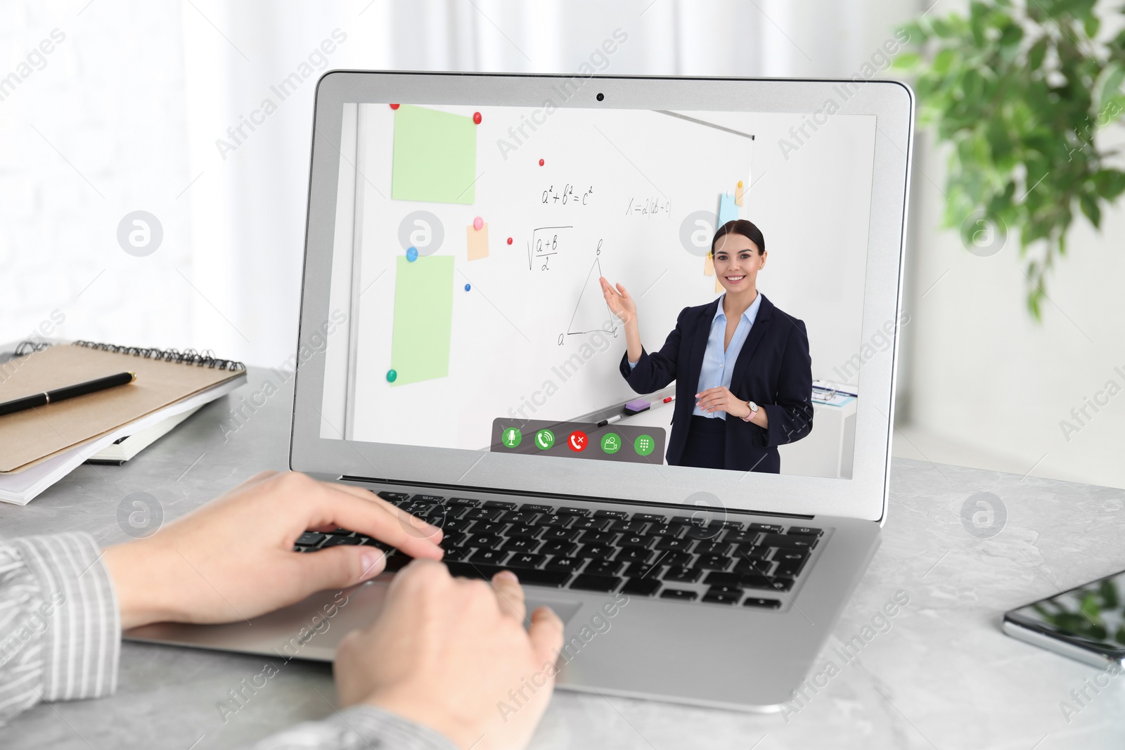 Image of Woman using laptop for online studying at home, closeup