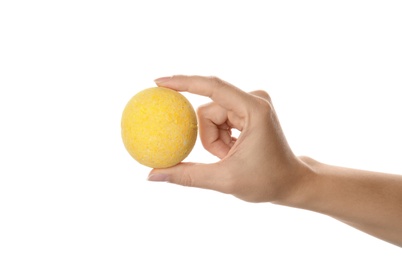 Photo of Woman holding bath bomb on white background, closeup