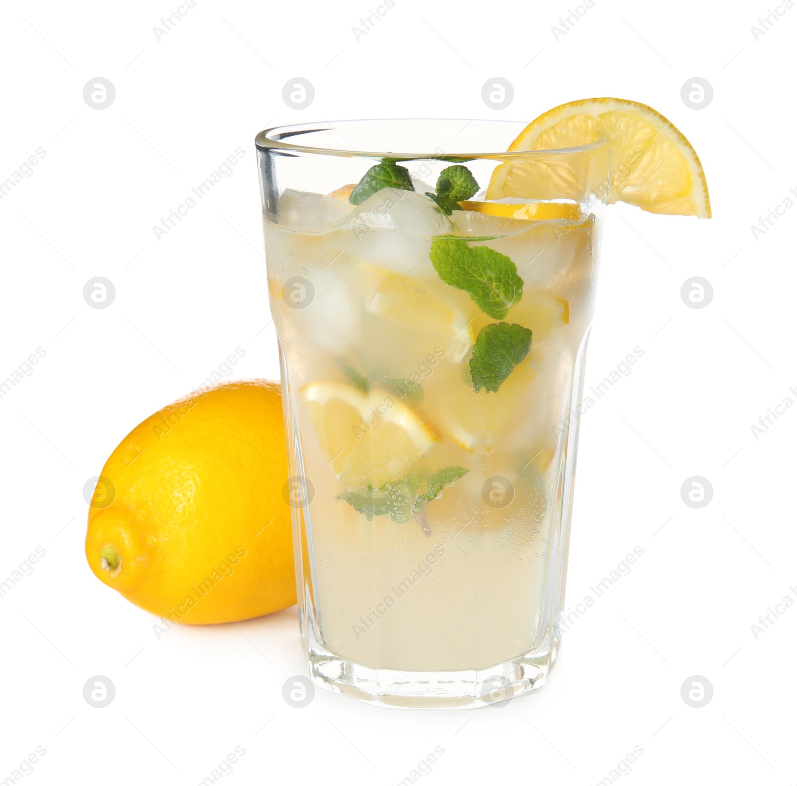 Photo of Refreshing lemonade with ice and mint in glass on white background