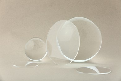 Photo of Composition with transparent glass balls on light grey background