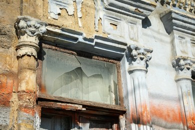 Photo of Old building with broken window after strong earthquake