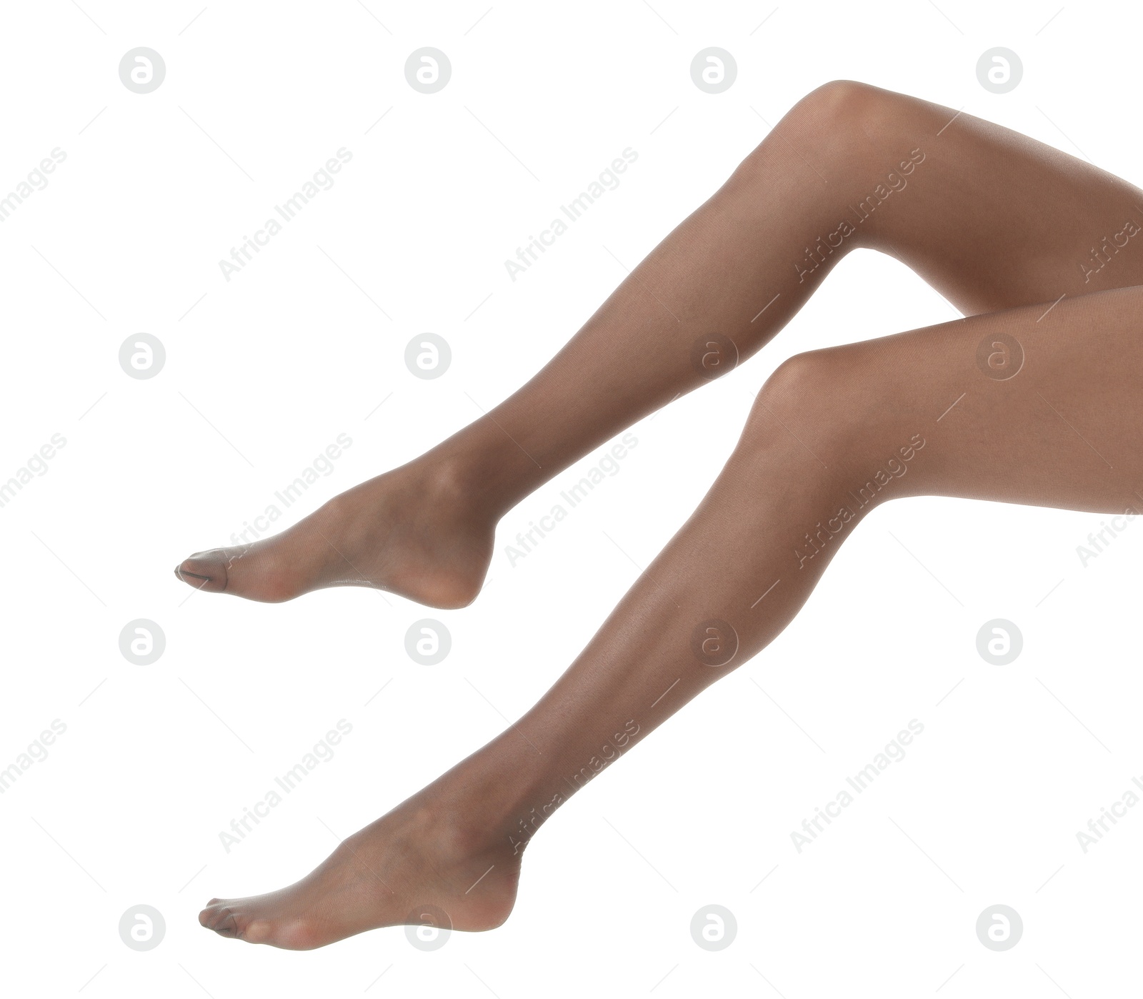 Photo of Legs of beautiful young woman in tights on white background, closeup