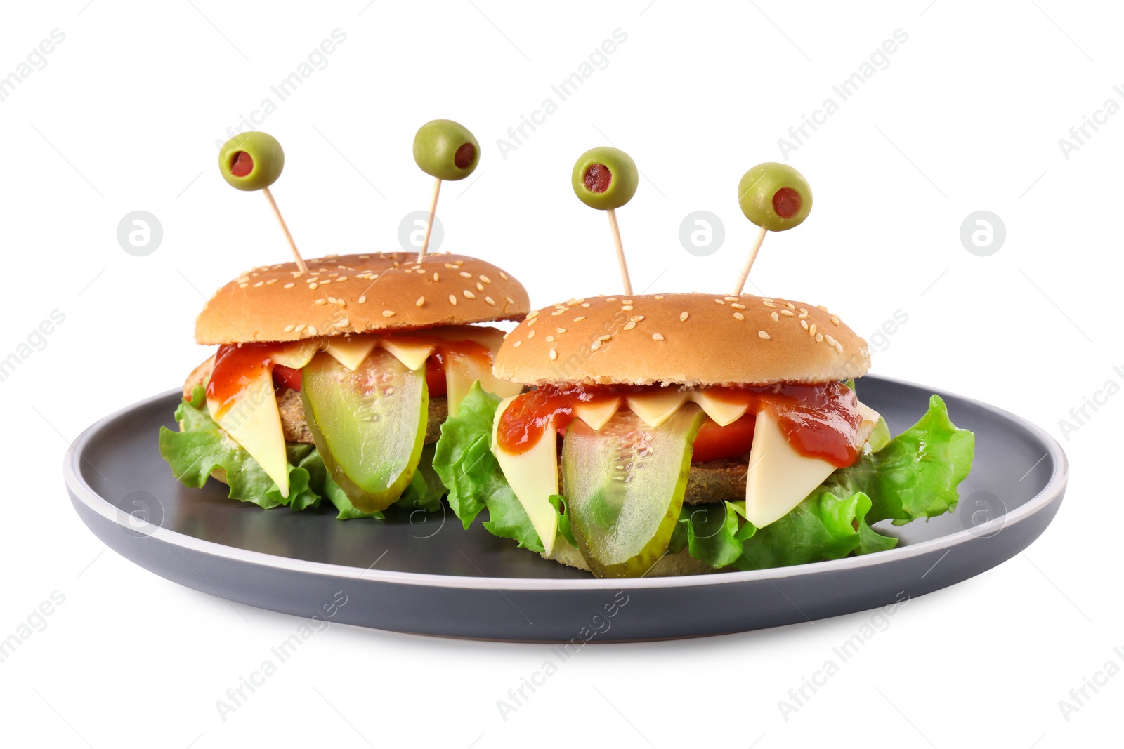 Photo of Cute monster burgers isolated on white. Halloween party food