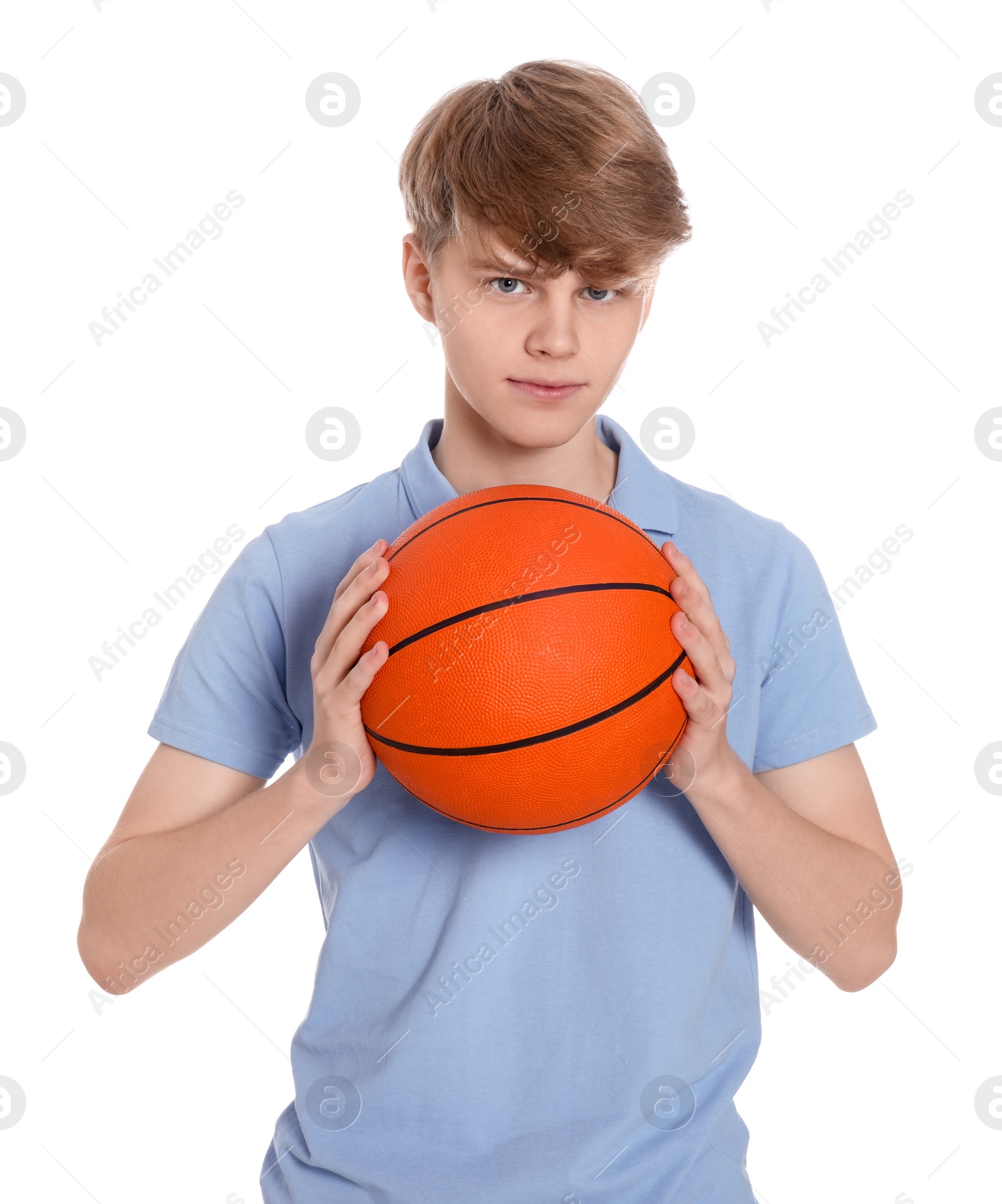 Photo of Teenage boy with basketball ball on white background