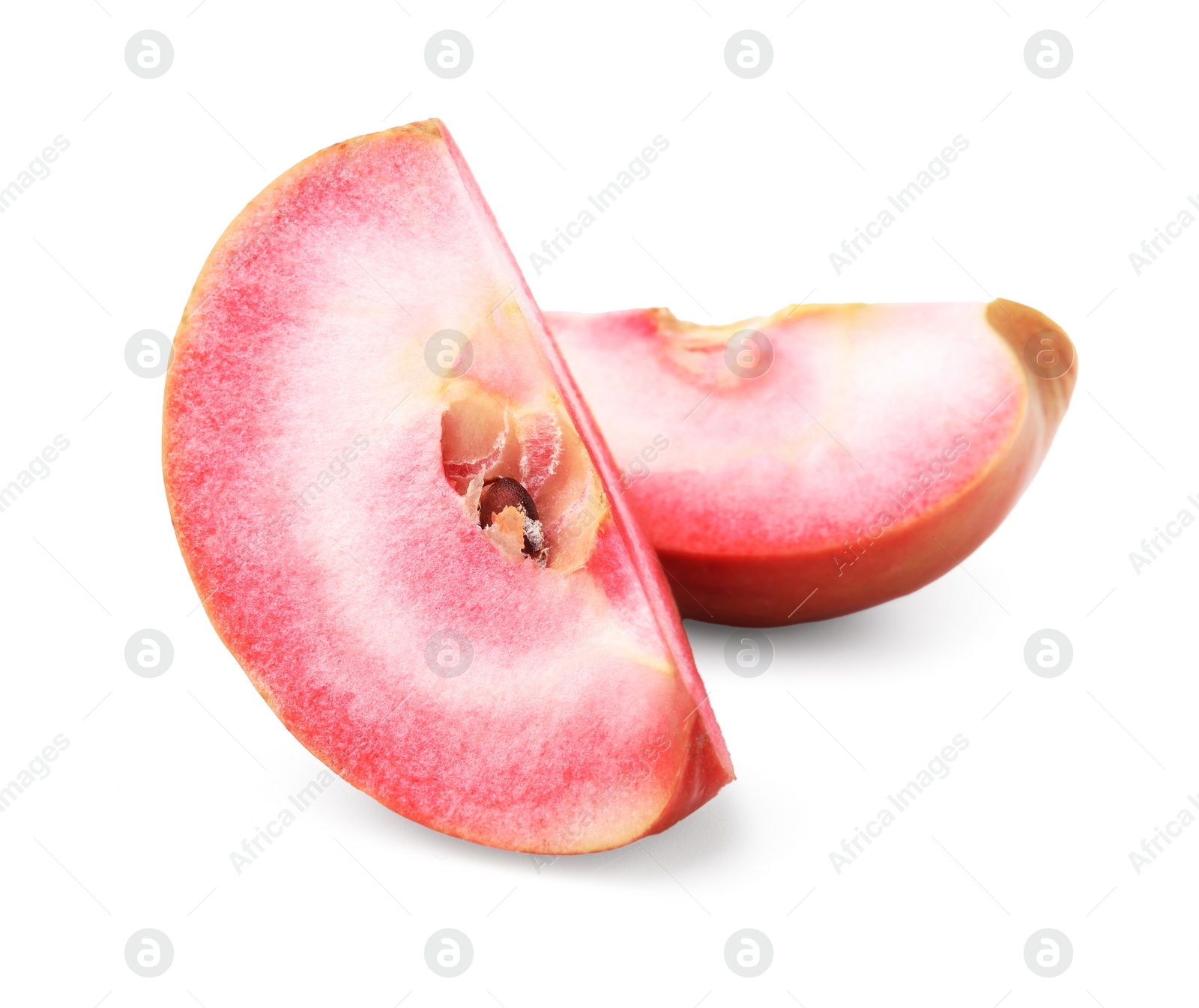 Photo of Slices of tasty apple with red pulp isolated on white