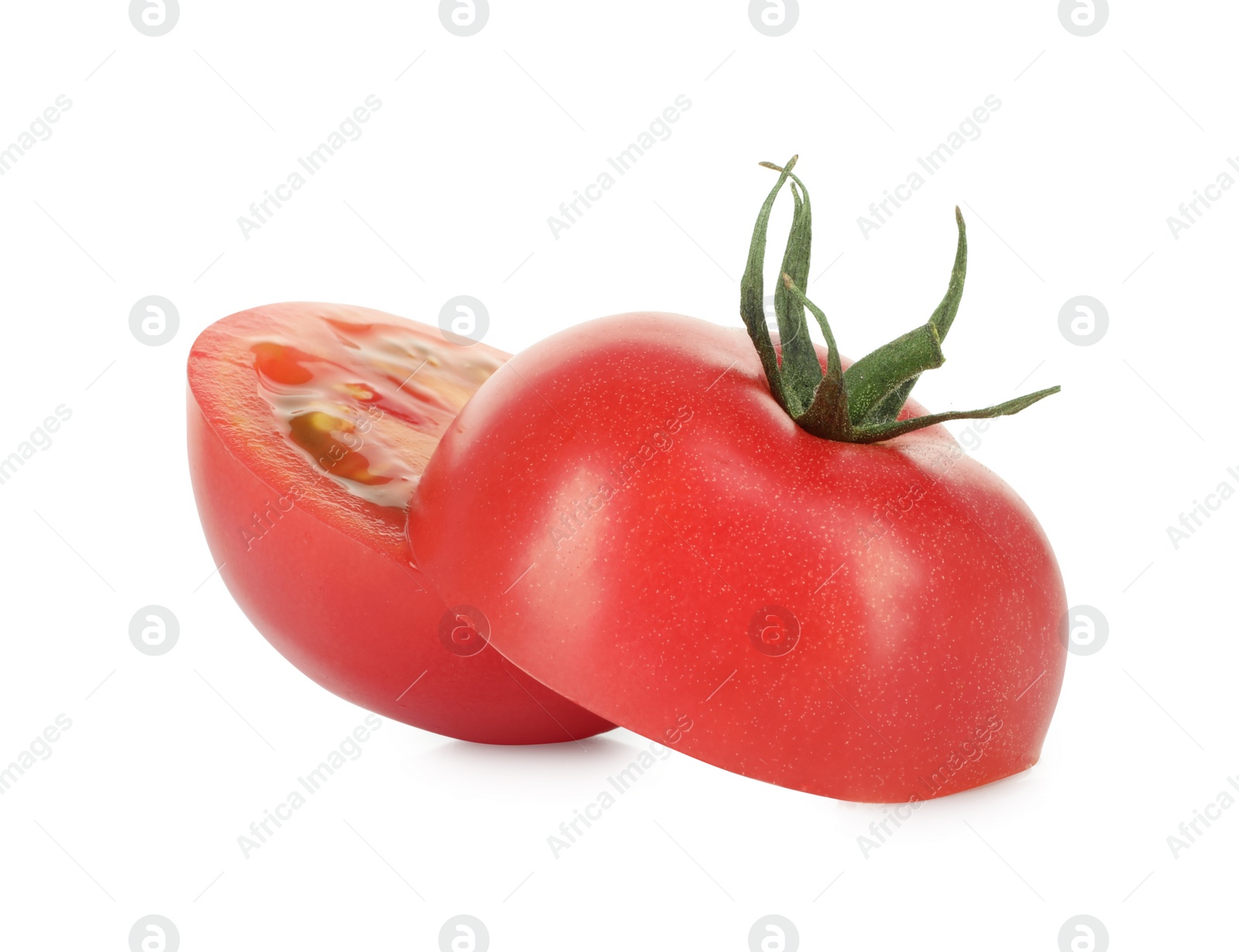 Halves of ripe cherry tomato isolated on white Photo of Halves of ripe cherry tomato isolated on white