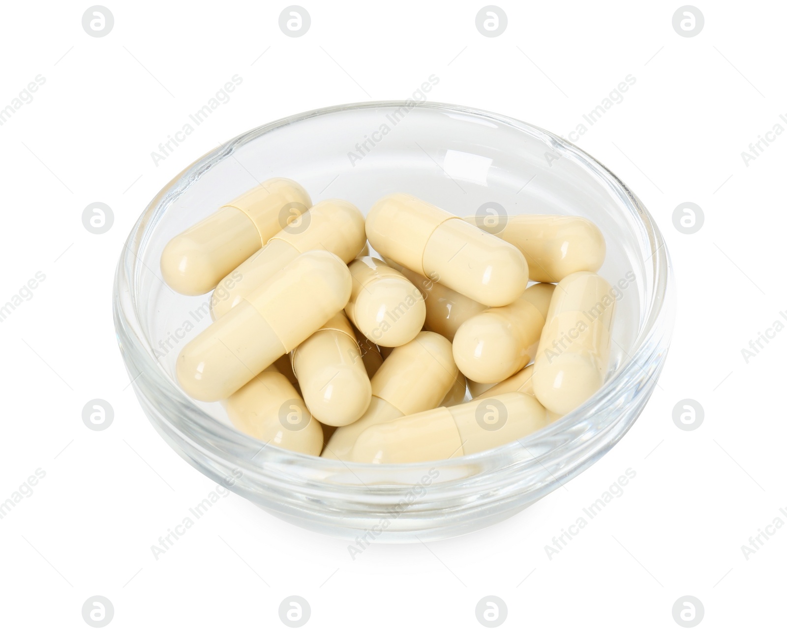 Photo of Vitamin capsules in bowl isolated on white. Health supplement