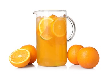 Freshly made lemonade in jug and oranges isolated on white