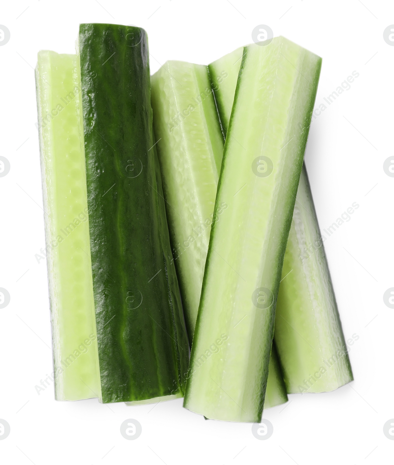 Photo of Pieces of fresh cucumber isolated on white, top view