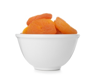 Photo of Bowl with apricots on white background. Dried fruit as healthy food