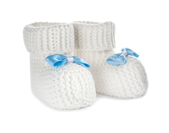 Handmade baby booties with bows isolated on white