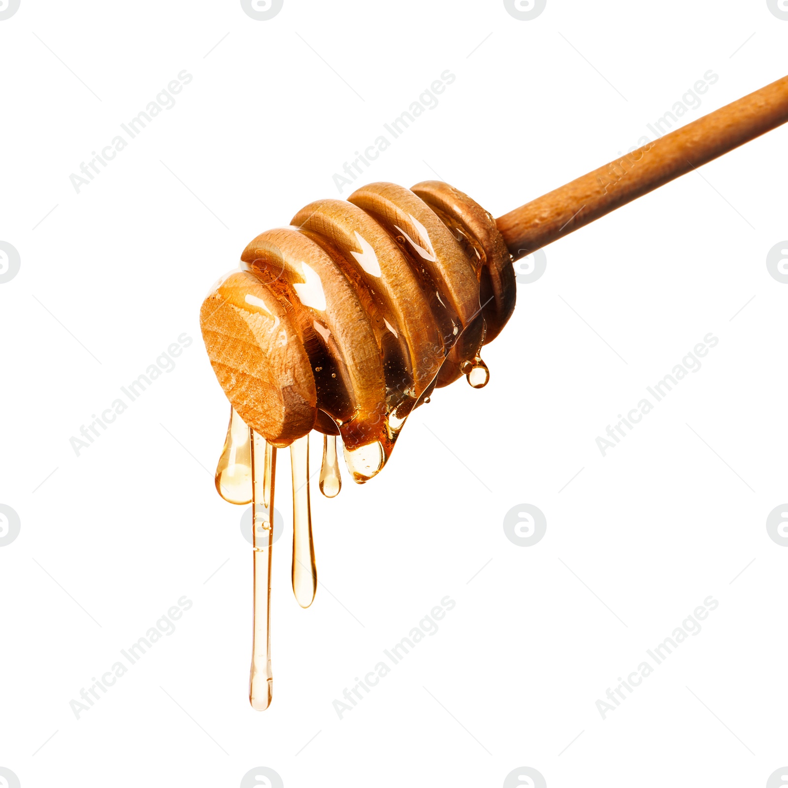 Image of Natural honey dripping from dipper on white background