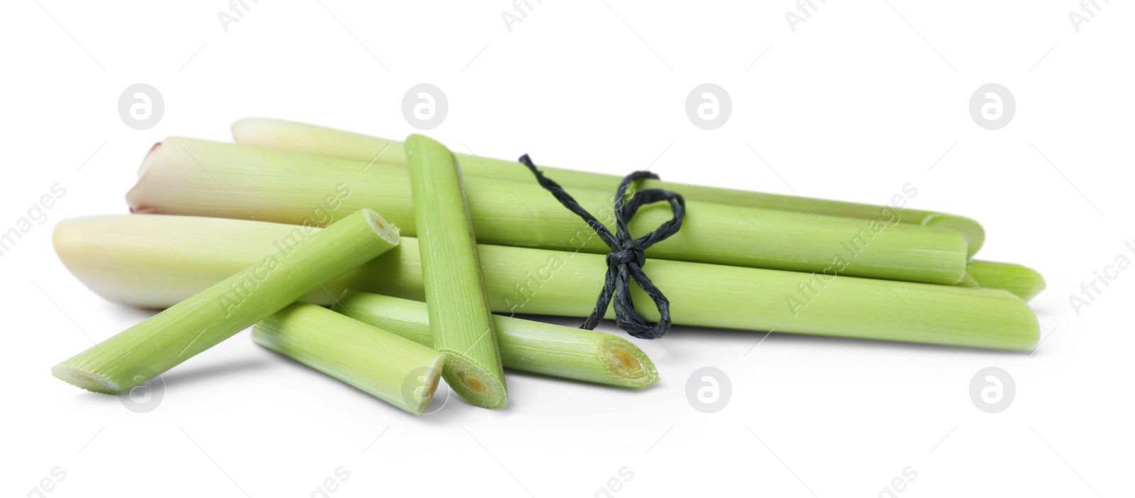 Photo of Bunch of fresh lemongrass on white background