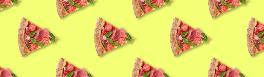 Image of Slices of delicious pizzas on yellow background, flat lay. Seamless pattern design