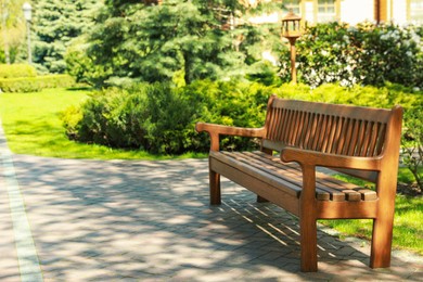 Beautiful view of wooden bench in park